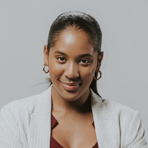 happy-woman-in-a-blazer-e1629382039228.jpg