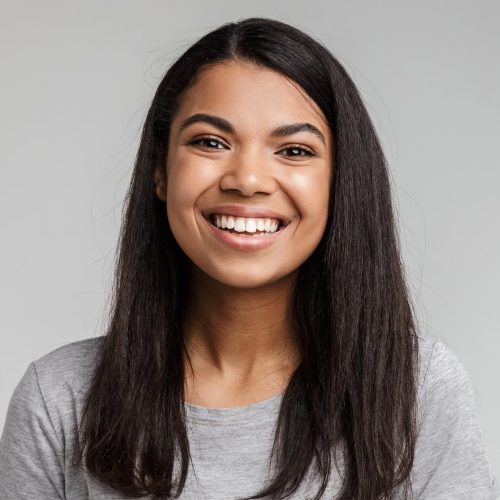 portrait-of-a-happy-smiling-young-african-woman-e1629382217793.jpg